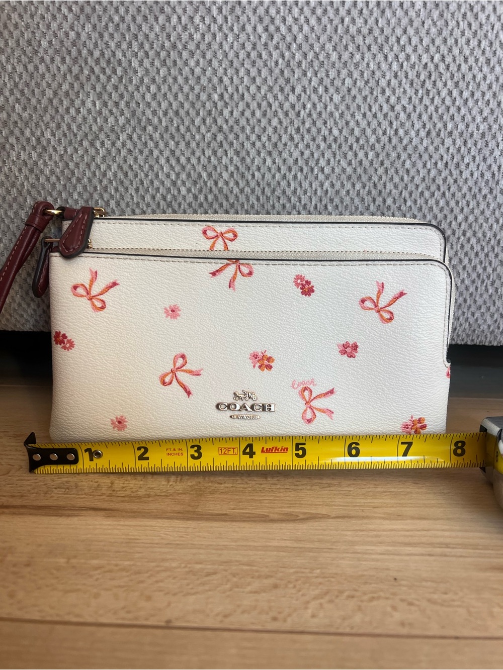 Coach White Wristlet with Pink Floral Bow Print